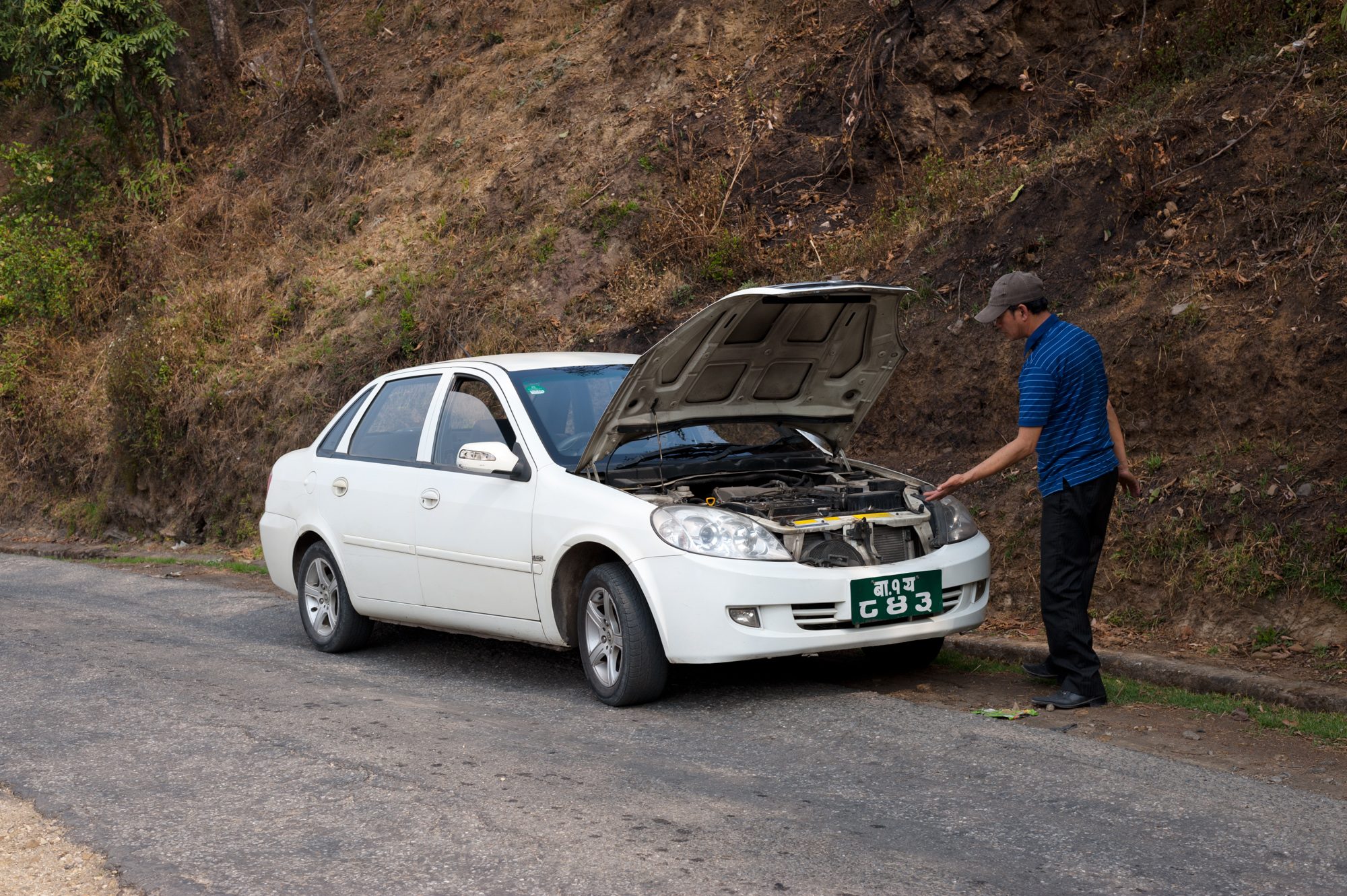 Checking the car on the way to Jiri